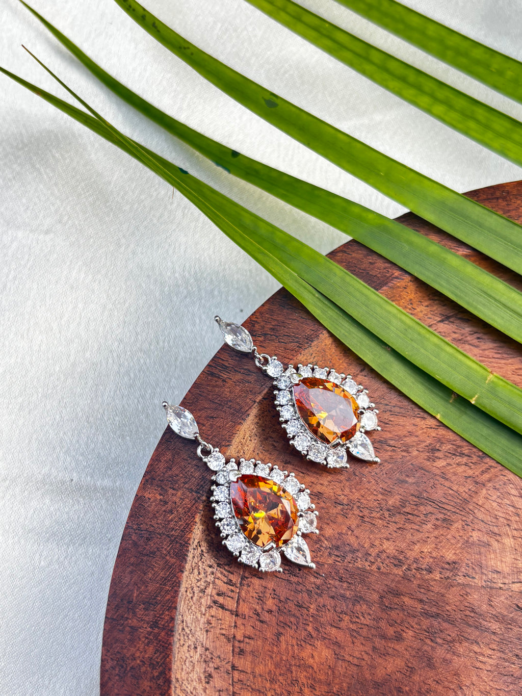 AMERICAN DIAMOND STATEMENT EARRING (SILVER BODY)